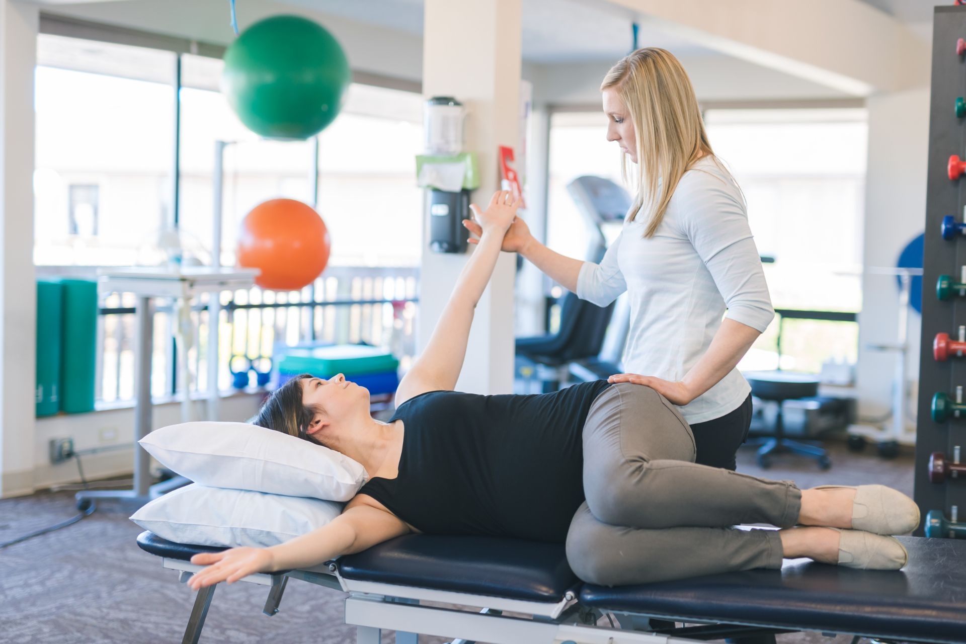 What is the proper form and technique for performing a weighted glute bridge with a barbell?