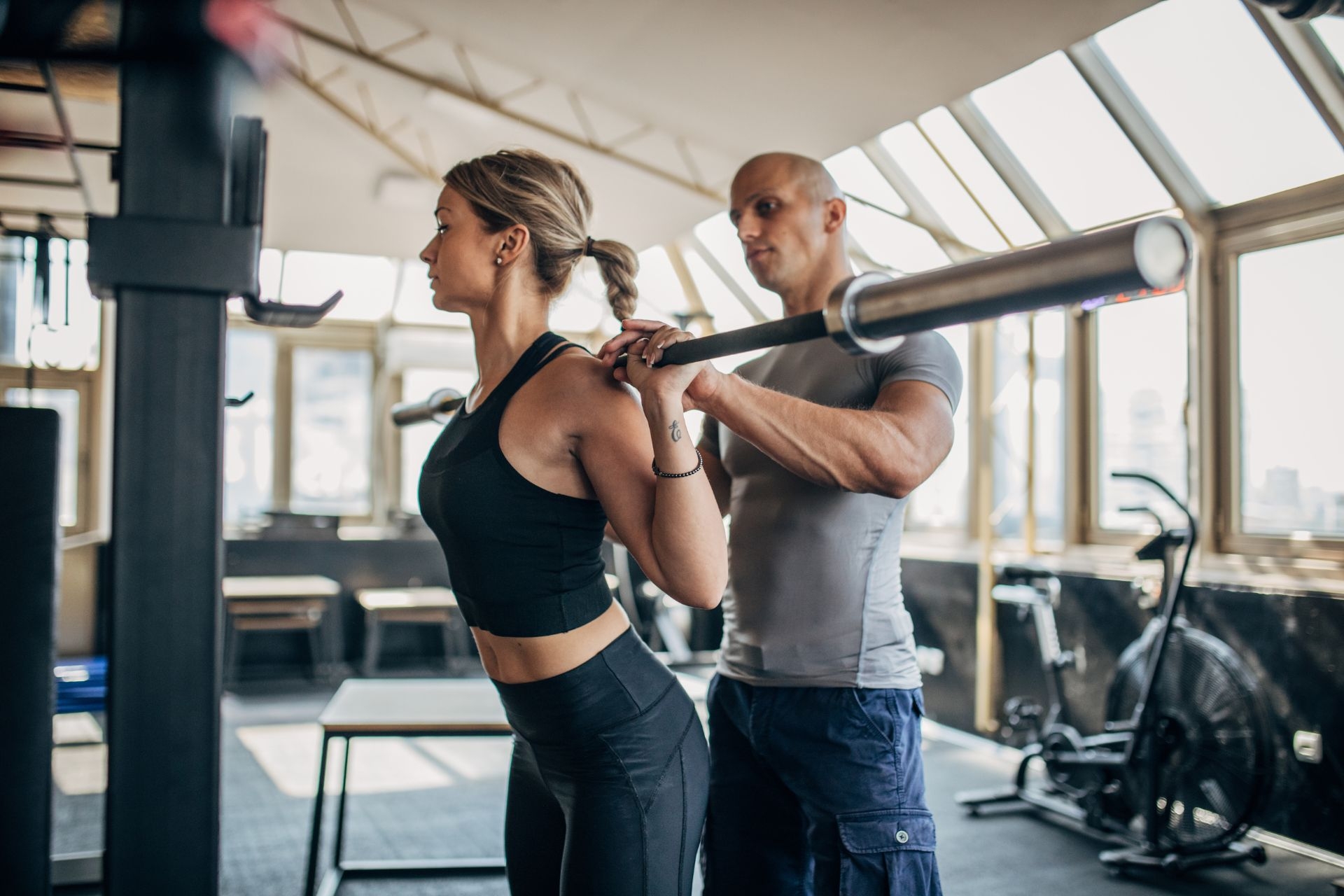 Are there any specific techniques or tips for maximizing triceps brachii activation during pushdown exercises?